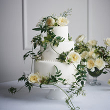 wedding cake with Patience roses with Charming milky buds ruffle out into ivory sculpted cups of delicate, lace-like petals revealing a creamy colored centre with just a hint of pale, buttery yellow.